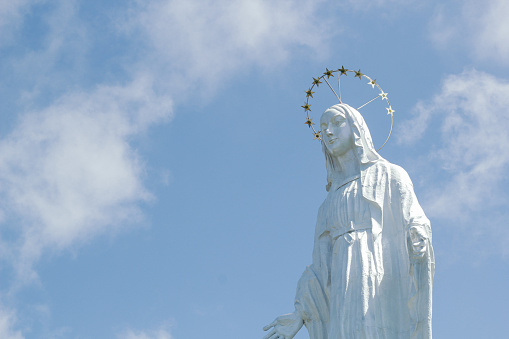 The statue of Our Lady of All Nations which is white in color and is placed on Nilo Hill, Sikka Regency, Maumere, Flores as a protector for Catholics and the city of Maumere