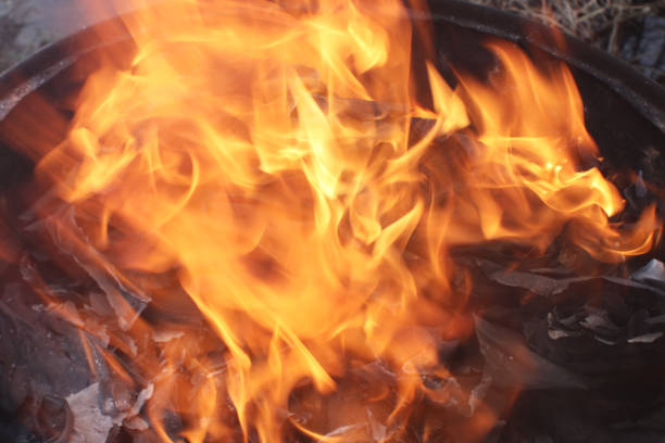 istock Flame Burning in a Metal Barrel 1609749024