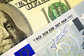 One Hundred Dollar Bill and European Union Euro Note