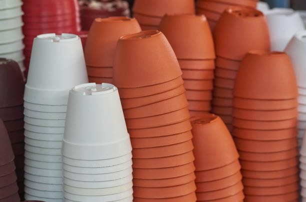 A lot of the plastic pots in the gardening shop stock photo