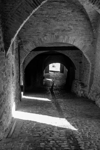 istock Old street in a medieval village in Marche 1609785172