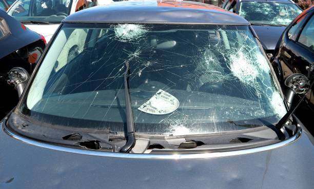 istock Windshield of a car severely damaged by hailstorm 1609814222