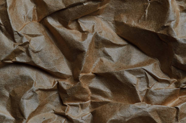 istock Background of the crumpled brown paper 1609814363