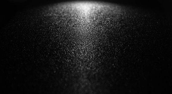 Rough leather surface with reflective white color. perspective and black background
