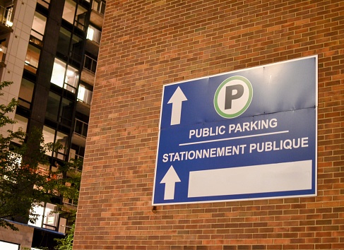 Bilingual public parking sign in Ottawa Canada