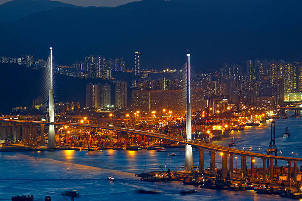 istock Freeway at night with cars light in modern city 160982030