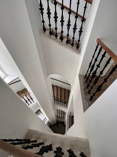 istock white painted staircase in an old house in Vienna Austria 1609833712