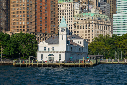 New York, USA - August 20, 2022: Pier A viewed from the Hudson river. Pier A (also known as City Pier A) is a pier in the Hudson River at Battery Park in Lower Manhattan.