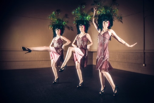 Cabaret dancer with peacock feather hat