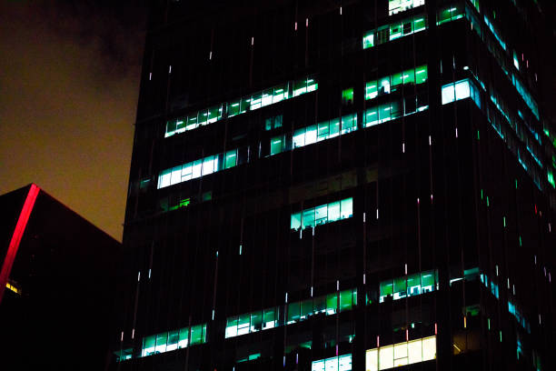 Night shot of illuminated office buildings  in Bangkok near Rama 9 Rd