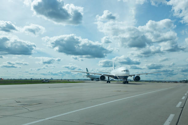 istock Airplane sitting on tarmac 1609858785