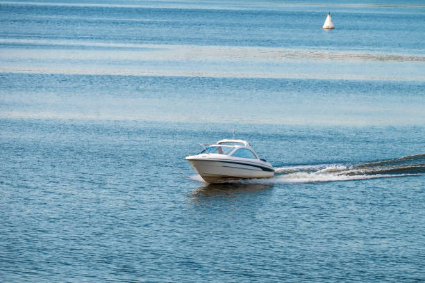 istock The motorboat is moving fast on the water. 1609860421