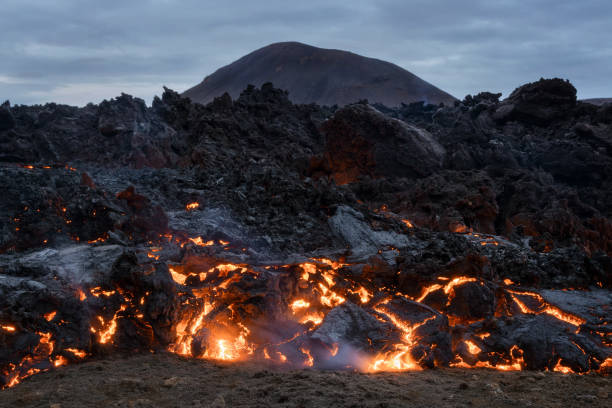 istock Volcano eruption and lava flow in Iceland 1609875764