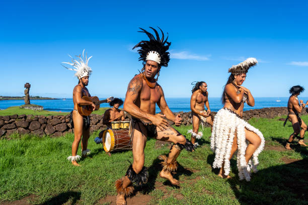 Easter Island, Chile - March 6, 2023: Easter Island dance show by local performers near Ahu Tahai complex, Easter Island (Rapa Nui), Chile.