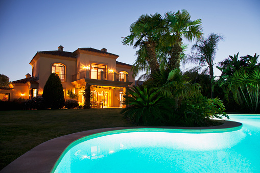 View of modern luxury house during dusk.