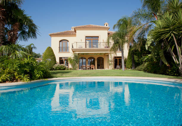istock Luxury swimming pool and Spanish villa 160992219
