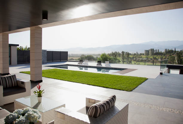 istock Luxury patio overlooking swimming pool and mountains 160992308