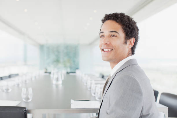 Business colleague smiling in office meeting