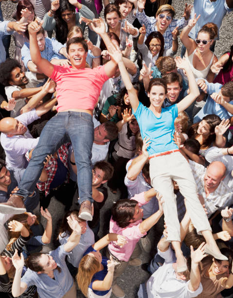 Portrait of man and woman crowd surfing  mosh pit stock pictures, royalty-free photos & images