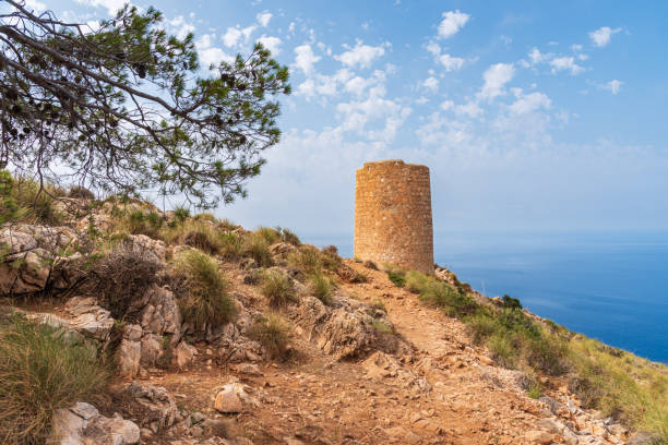 Watchtower of Cerro Gordo, also known as La Herradura or El Nogal tower, built in the 16th century on top of another of Arab origin. Watchtower of Cerro Gordo, also known as La Herradura or El Nogal tower, built in the 16th century . nature park stock pictures, royalty-free photos & images