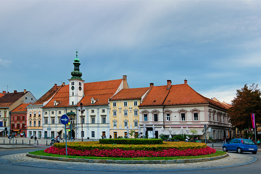 Picturesque panoramic landscape view of medieval colorful buildings on the Rotovz Town Hall Square in Maribor. Famous touristic place and travel destination in Slovenia.