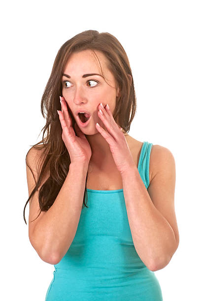 istock surprised young woman 160996951