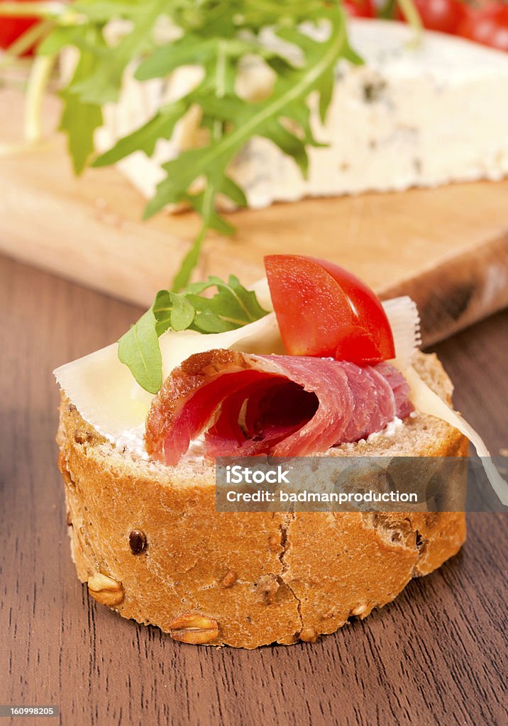 bruschetta de solteiro - Foto de stock de Comida royalty-free