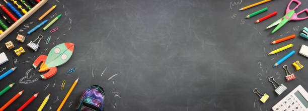 istock Back to school concept. rocket and pencils over classroom blackboard. Top view 1609991246