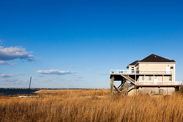 House on the Shore Hamptons Long Island Modern house located at the famous Hampton area along Dune road. Long Island , New York the hamptons stock pictures, royalty-free photos & images