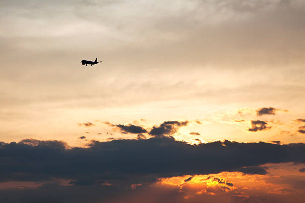 istock Airplane Ascending into the Sunset 161000447