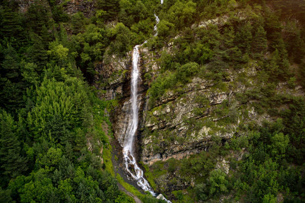 istock panorama of summer mountains with waterfalls 1610046609