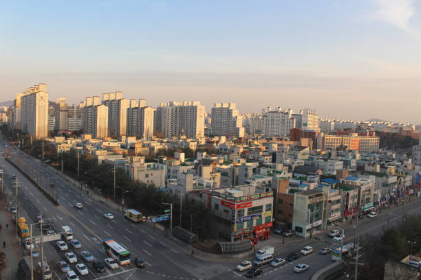 Corner of an intersection in a densely populated residential area at sunset