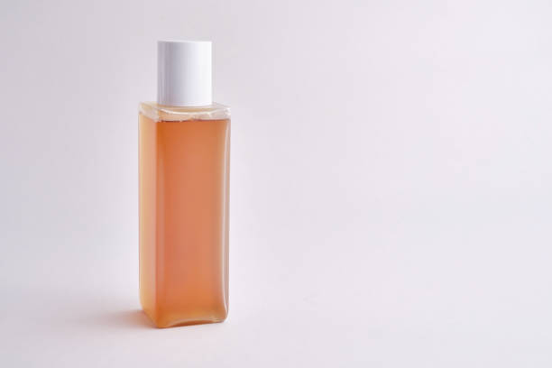 istock Container for cream, shampoo, toiletries, spa. Unbranded white and plastic bottles. Bottle with a dispenser for cosmetics. Skin care and beauty concept. Mockup style, copy space 1610059840