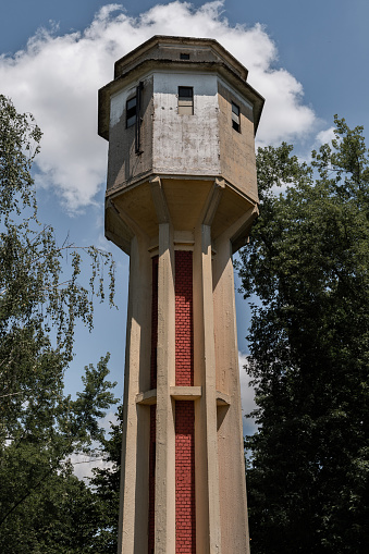 Water tower with trees
