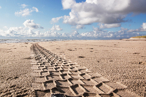 An empty beach near Camperduin in the Netherlands, with a beautiful cloudscape