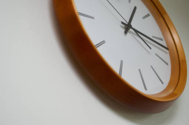 istock Background of the scene a clock on the wall 1610139083