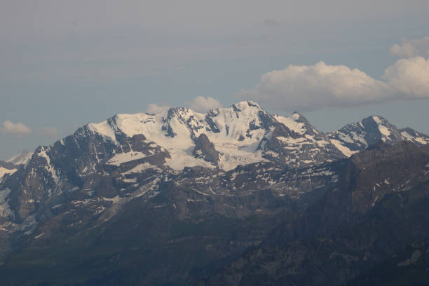 istock Bluemlisalp Range in summer, view from Niesen Kulm. 1610165053