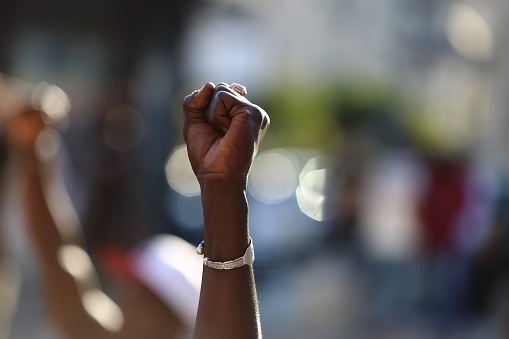 Puño cerrado con la mano negra - Black Lives Matter photo