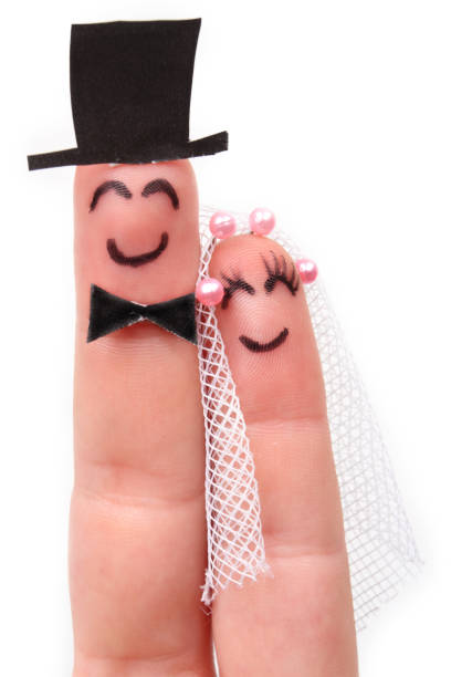 istock husband and wife, married, drawing on the fingers 1610173700