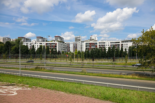 Warsaw, Poland - July 30, 2023: General view of the southern end of the Goclaw housing estate. A fragment of the city street is visible.