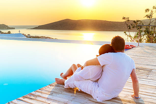 istock A couple relaxing by water in Crete 161018354