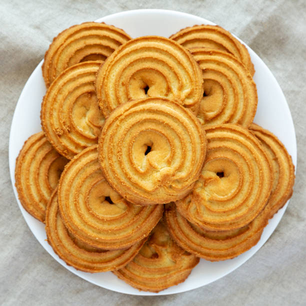istock Homemade Sprits Biscuits on a Plate, top view. Flat lay, overhead, from above. Close-up. 1610187356