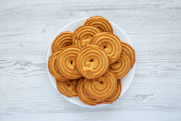 istock Homemade Sprits Biscuits on a Plate, top view. Flat lay, overhead, from above. 1610187369