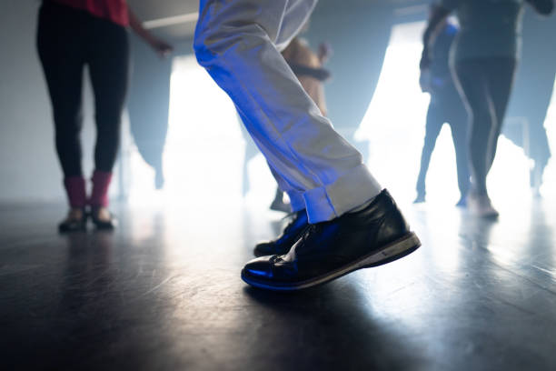Low section of a senior man dancing