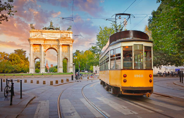 Old tram at The Peace Arch (Arco della Pace) at Sempione square (Piazza Sempione) in the centre of Milan