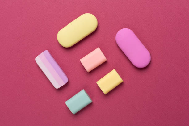 istock Colorful eraser on color backgroung, top view 1610296916