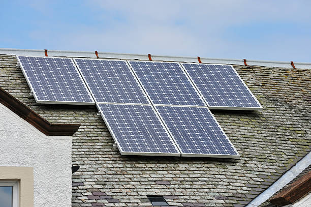 istock Solar panels on the roof on an old building 161029712