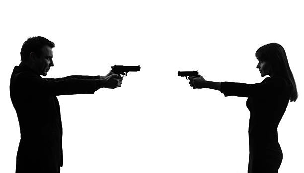 istock couple woman man in duel  silhouette 161032232