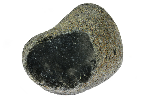 black flint from the Baltic Sea coast in Waabs, Germany isolated on white background