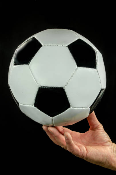 istock Football ... Soccer Ball Hand Held 161038060